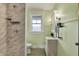 Bathroom with new walk-in shower, sink and vanity at 3140 N Washington Blvd, Indianapolis, IN 46205