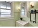 Light and bright bathroom with a sink and vanity at 3140 N Washington Blvd, Indianapolis, IN 46205