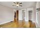 Empty room with hardwood floors, closet, and entry to the rest of the house at 3140 N Washington Blvd, Indianapolis, IN 46205