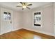 Bedroom features hardwood flooring and lots of natural light at 3140 N Washington Blvd, Indianapolis, IN 46205