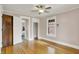 Neutral bedroom with hardwood floors and a closet in an empty room at 3140 N Washington Blvd, Indianapolis, IN 46205
