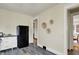 Bright kitchen with modern appliances, minimalist decor, and seamless access to the dining area, perfect for entertaining at 3140 N Washington Blvd, Indianapolis, IN 46205