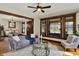 Cozy living room with hardwood floors, a comfortable sofa, and view to the front yard at 3140 N Washington Blvd, Indianapolis, IN 46205