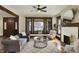 Bright living room with fireplace, large windows and comfortable seating at 3140 N Washington Blvd, Indianapolis, IN 46205