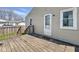 Close-up of the home's back entry with a wooden deck, offering a private outdoor space at 3346 S Lockburn St, Indianapolis, IN 46221
