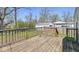 Spacious wooden deck, perfect for outdoor entertaining and enjoying the serene backyard at 3346 S Lockburn St, Indianapolis, IN 46221
