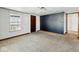 Inviting living room with carpet floors and neutral walls, providing a versatile space for relaxation and entertainment at 3346 S Lockburn St, Indianapolis, IN 46221