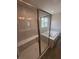 Luxurious bathroom showcasing a glass-enclosed shower and a separate soaking tub at 338 Mcnair Dr, Whiteland, IN 46184