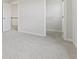 Bedroom with neutral carpet, closet, and white trim at 338 Mcnair Dr, Whiteland, IN 46184