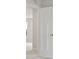 Bedroom with a white door and trim, neutral carpet and walls, and natural light at 338 Mcnair Dr, Whiteland, IN 46184