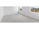 Bright bedroom with plush carpet and natural light from two windows at 338 Mcnair Dr, Whiteland, IN 46184