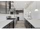 Modern kitchen with stainless steel appliances and a long island at 338 Mcnair Dr, Whiteland, IN 46184