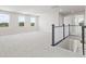 Spacious loft with carpeting, three windows, and natural light at 338 Mcnair Dr, Whiteland, IN 46184