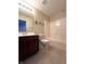Bathroom featuring a shower and vanity with dark wood cabinet at 3476 Golden Gate N Dr, Carmel, IN 46074