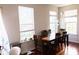 Bright dining room with large windows and hardwood floors at 3476 Golden Gate N Dr, Carmel, IN 46074