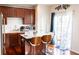 Modern kitchen with stainless steel appliances and center island at 3476 Golden Gate N Dr, Carmel, IN 46074