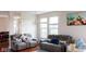 Cozy living room with plush sofas and elegant chandelier at 3476 Golden Gate N Dr, Carmel, IN 46074