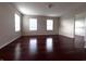 A spacious main bedroom with hardwood flooring and natural light at 3476 Golden Gate N Dr, Carmel, IN 46074