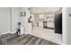 Modern kitchen featuring white cabinets, stainless steel appliances and stone countertops at 3544 Guilford Ave, Indianapolis, IN 46205
