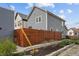 Backyard exterior featuring a privacy fence, gravel area and partial view of the siding at 357 Parkway Ave, Indianapolis, IN 46225