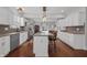Spacious kitchen with white cabinets, granite countertops, and a large central island at 357 Parkway Ave, Indianapolis, IN 46225