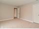Bedroom featuring neutral walls, plush carpeting, and a closet at 3930 Towhees Dr, Indianapolis, IN 46237