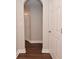 Hallway with white trim and neutral walls leads to several rooms at 3930 Towhees Dr, Indianapolis, IN 46237