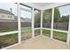 The screened porch offers views of the backyard at 3930 Towhees Dr, Indianapolis, IN 46237