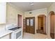 Functional kitchen area with white appliances and abundant cabinet storage at 415 S East St, Plainfield, IN 46168