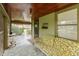 Inviting screened porch with comfortable seating and a view of the surrounding landscape at 415 S East St, Plainfield, IN 46168