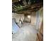 Unfinished basement with exposed ceiling, concrete floor, and potential for customization at 4206 Clark St, Anderson, IN 46013