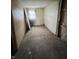 Bedroom featuring worn carpet and aged walls, presenting an opportunity for a full renovation at 4206 Clark St, Anderson, IN 46013