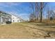 A large backyard adjoins wooded area at 4333 Ironclad Dr, Bargersville, IN 46106