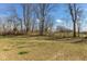 Spacious backyard that backs up to a line of trees on a clear day at 4333 Ironclad Dr, Bargersville, IN 46106