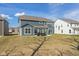 Expansive backyard with patio and well-maintained lawn, perfect for outdoor entertaining at 4333 Ironclad Dr, Bargersville, IN 46106