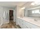 Bathroom with double vanity, modern fixtures, and walk-in closet at 4333 Ironclad Dr, Bargersville, IN 46106