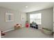 Neutral bedroom featuring carpet floors, natural light, and space for various activities at 4333 Ironclad Dr, Bargersville, IN 46106
