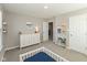 Bright bedroom with carpeted floors, white trim, and a large window at 4333 Ironclad Dr, Bargersville, IN 46106