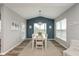 Elegant dining room with modern light fixture, decor, and neutral color palette at 4333 Ironclad Dr, Bargersville, IN 46106