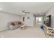 Spacious living room with a gray sofa and neutral decor at 4333 Ironclad Dr, Bargersville, IN 46106