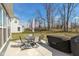 Backyard patio with a table, chairs, and barbecue, perfect for outdoor dining at 4333 Ironclad Dr, Bargersville, IN 46106