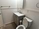 Updated bathroom with vanity, toilet, and modern fixtures at 5209 S Bancroft St, Indianapolis, IN 46237