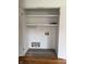 Functional closet with shelves and connections for laundry appliances at 5209 S Bancroft St, Indianapolis, IN 46237