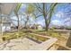 A large, tree filled backyard and deck at 525 S Keystone Ave, Indianapolis, IN 46203