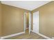 This bedroom features neutral walls, two closets and wood-look flooring at 525 S Keystone Ave, Indianapolis, IN 46203