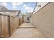 Large back deck featuring wood boards and privacy fence with access to yard at 5802 Crittenden Ave, Indianapolis, IN 46220
