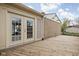 A cozy wooden deck offers a nice space for relaxing or entertaining in the backyard at 5802 Crittenden Ave, Indianapolis, IN 46220