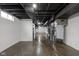 Spacious unfinished basement showcasing exposed ductwork and room for storage or customization at 5802 Crittenden Ave, Indianapolis, IN 46220