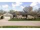 Charming ranch-style home with stone exterior and attached two-car garage at 5802 Crittenden Ave, Indianapolis, IN 46220