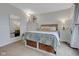 Comfortable bedroom with natural light, carpeted floors, and storage baskets under the bed at 5925 Leisure Ln, Pittsboro, IN 46167